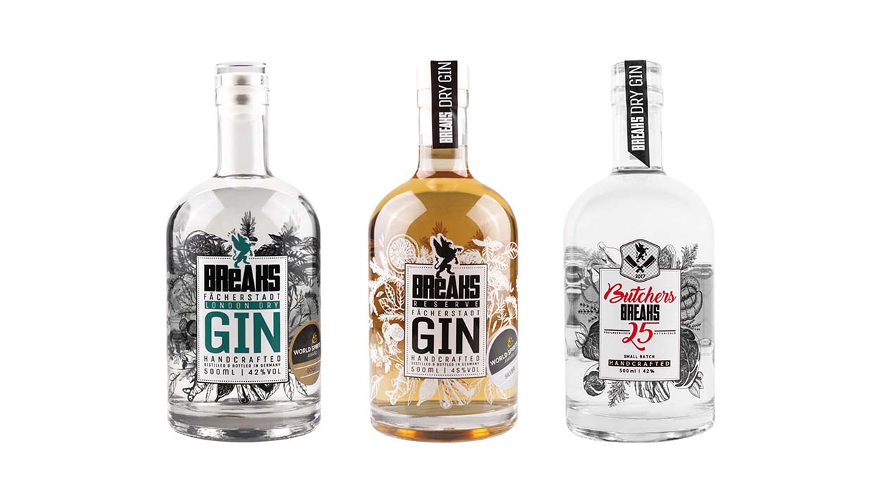 Flasche Breaks London Dry Gin, Breaks Reserve Dry Gin und Butchers Breaks 25 auf weißem Hinterund